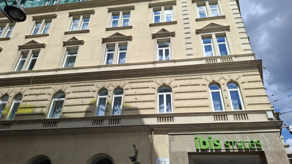 A wide view of the compact but highly efficient, colorful hotel room layout