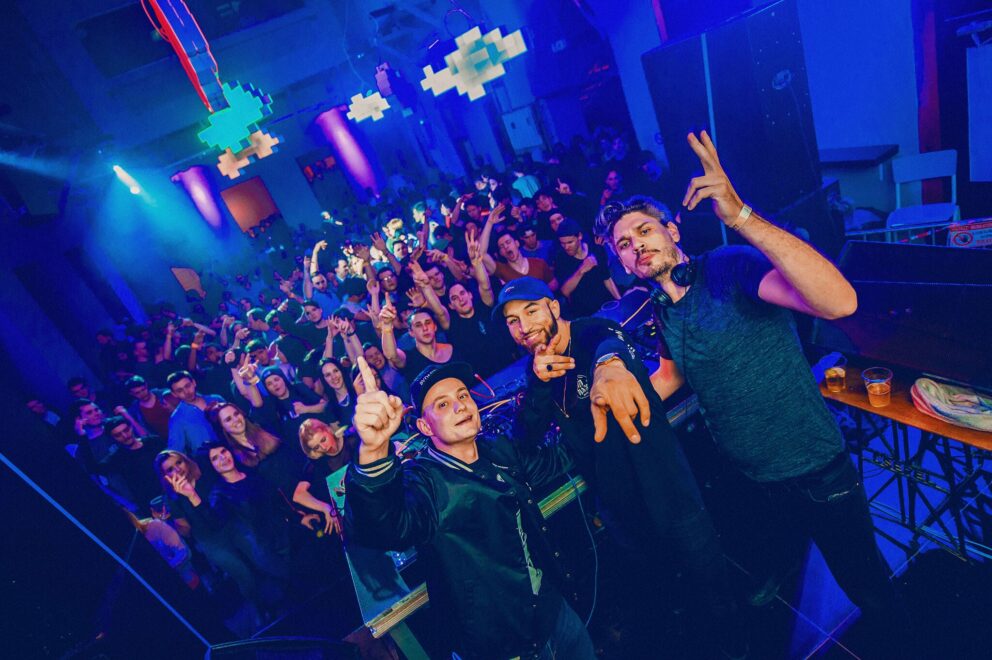 A massive flock of beautifully sculpted flying rabbits running heavily across the club ceiling