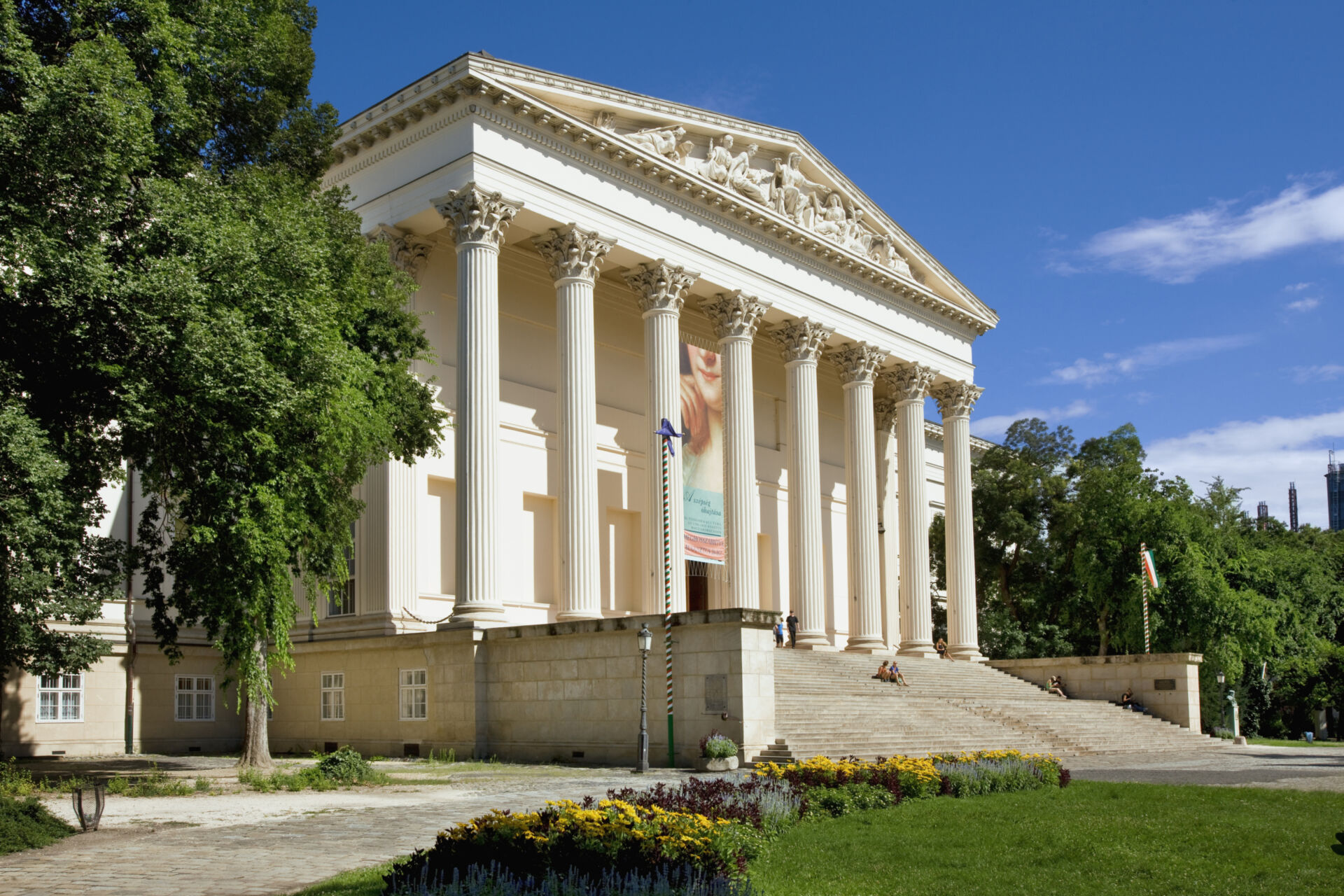 Ornate ceiling frescoes and symmetrical marble corridors inside the Hungarian National Museum
