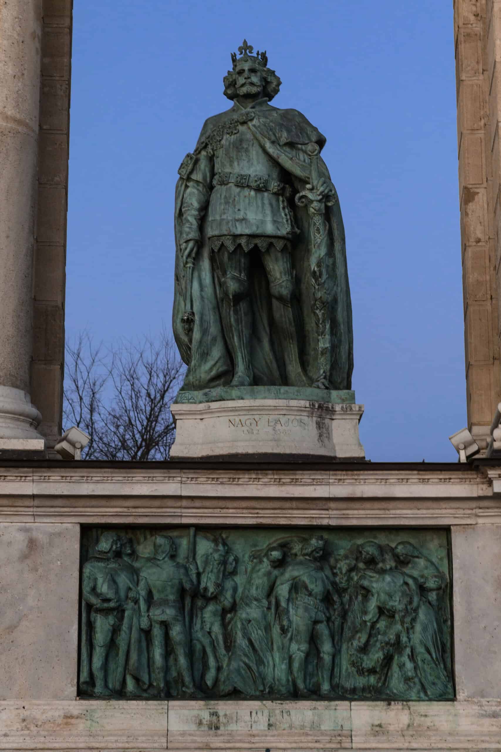 The armored statue of military commander János Hunyadi holding a mace