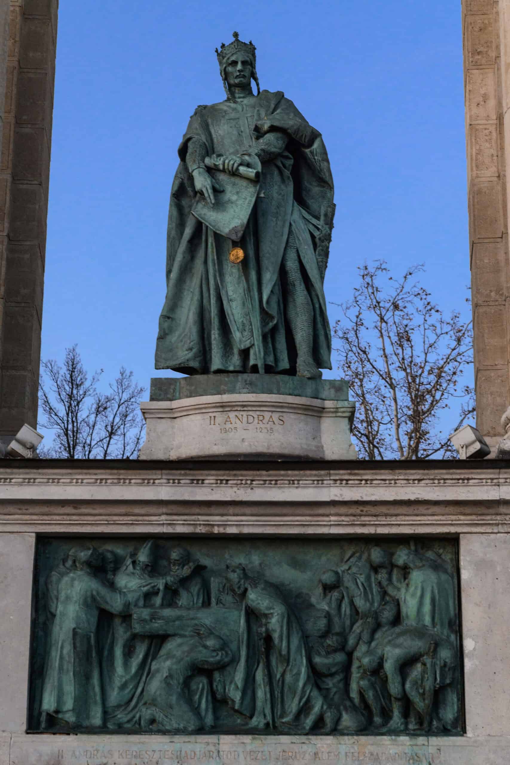The statue of King Coloman holding a book in the colonnade