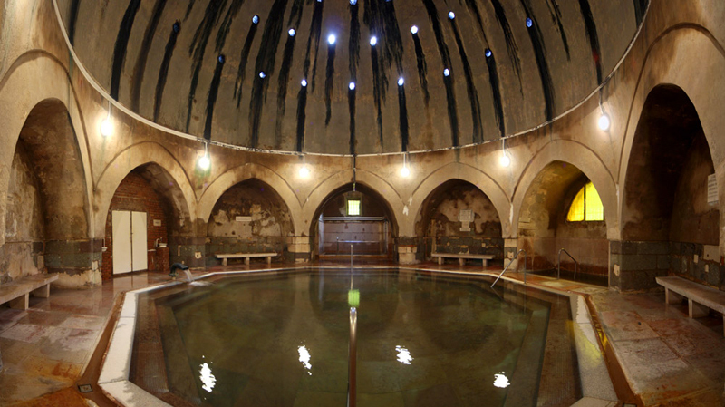 The might interior of the Ottoman-era Király bath