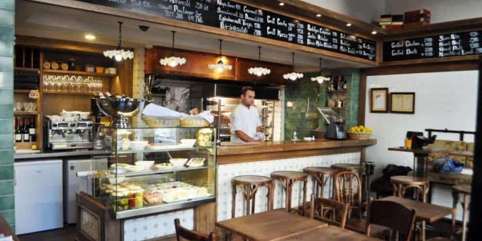 The cozy and rustic interior of Kispiac Bistro in Budapest