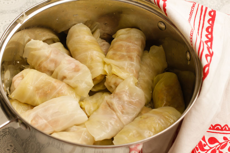 Minced meat filling wrapped in cabbage leaves in a pot 