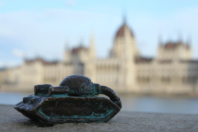 The tiny bronze tank mini-statue by Kolodko on the Buda side embankment