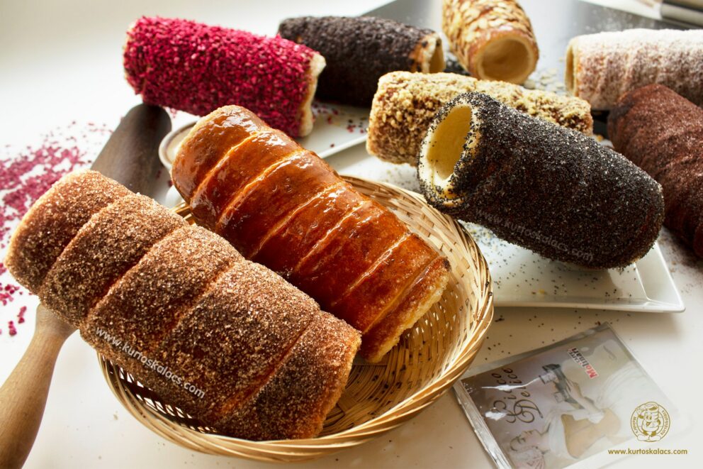 A colorful variety of chimney cakes with different sweet coatings