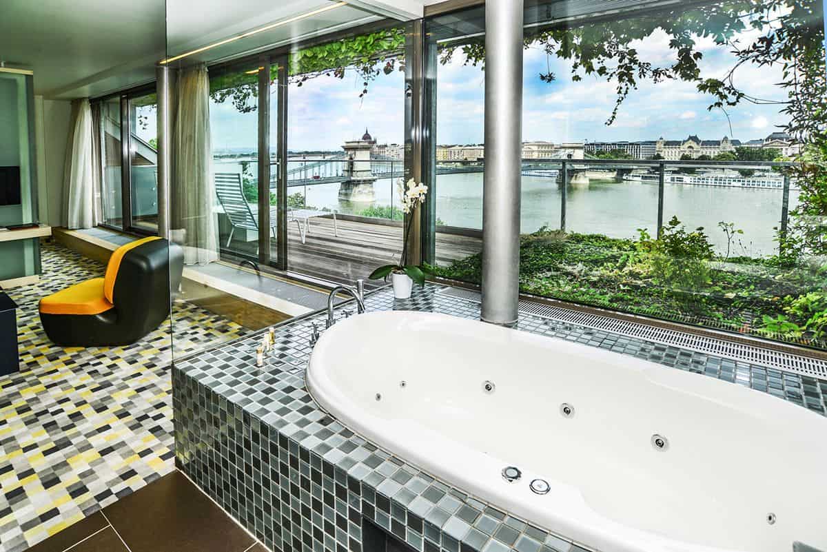 The dynamic glass facade of Lánchíd 19 Boutique Hotel near the Chain Bridge