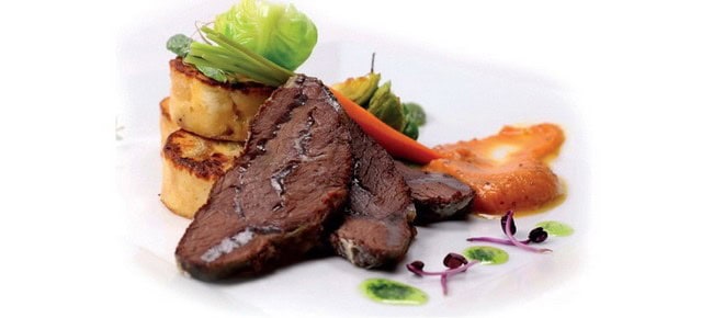 The sleek, panoramic glass-roofed design of a premium Legenda sightseeing boat