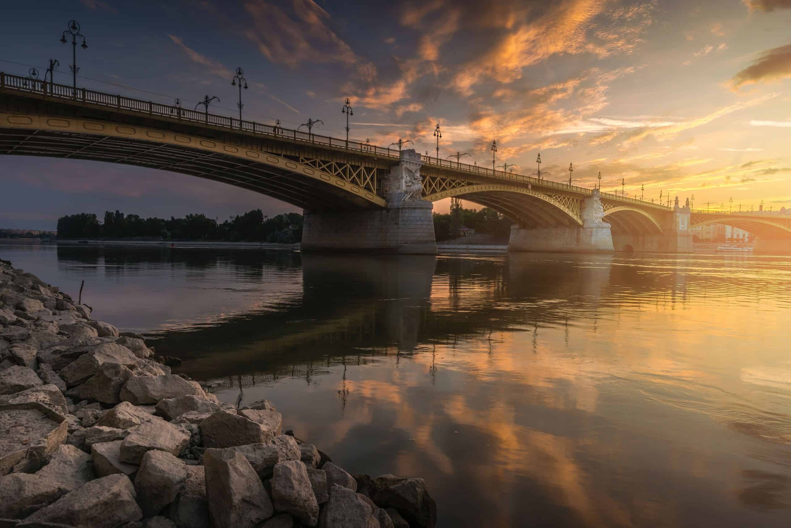 The striking green metal structure of the Liberty Bridge in Budapest