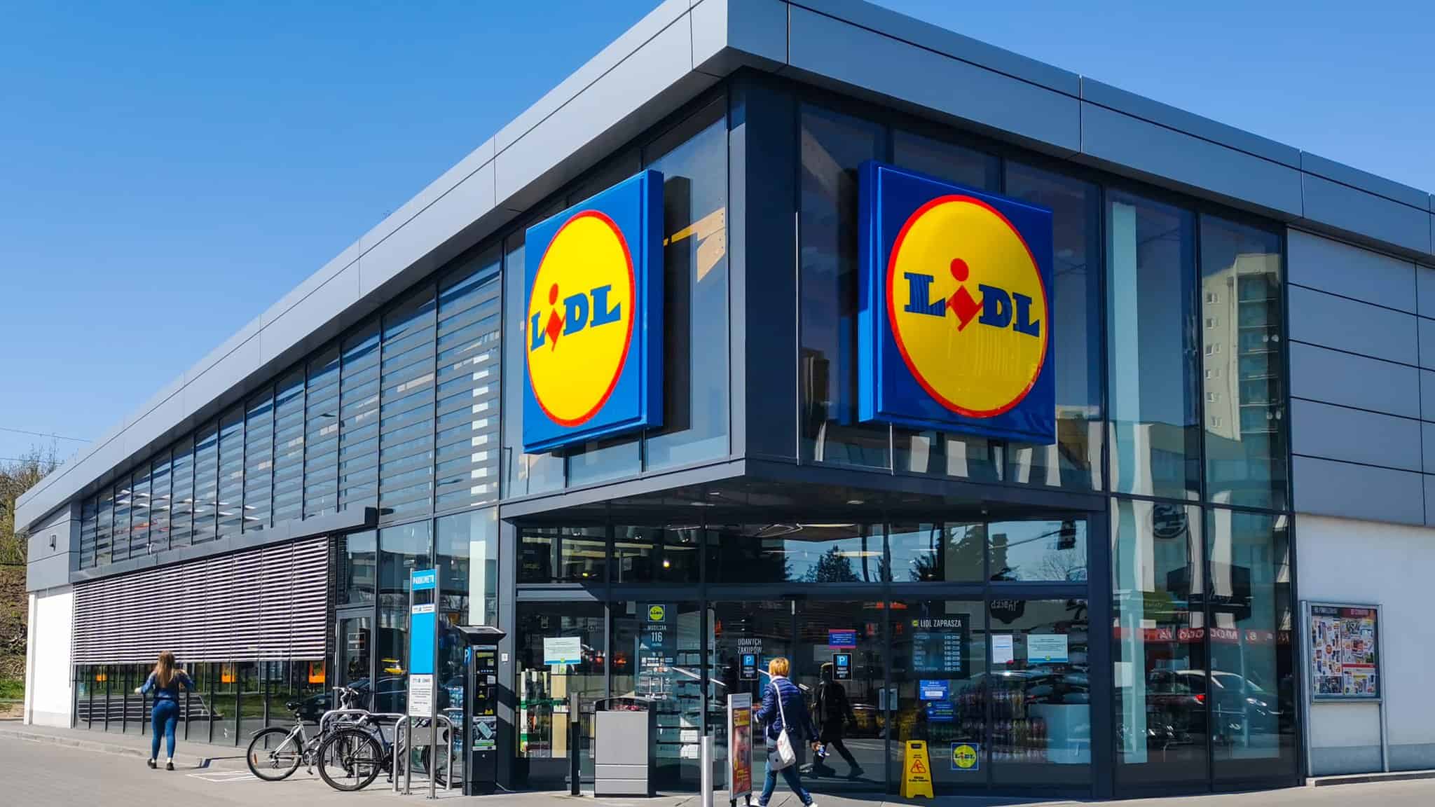 The modern glass storefront and entrance of a Lidl supermarket