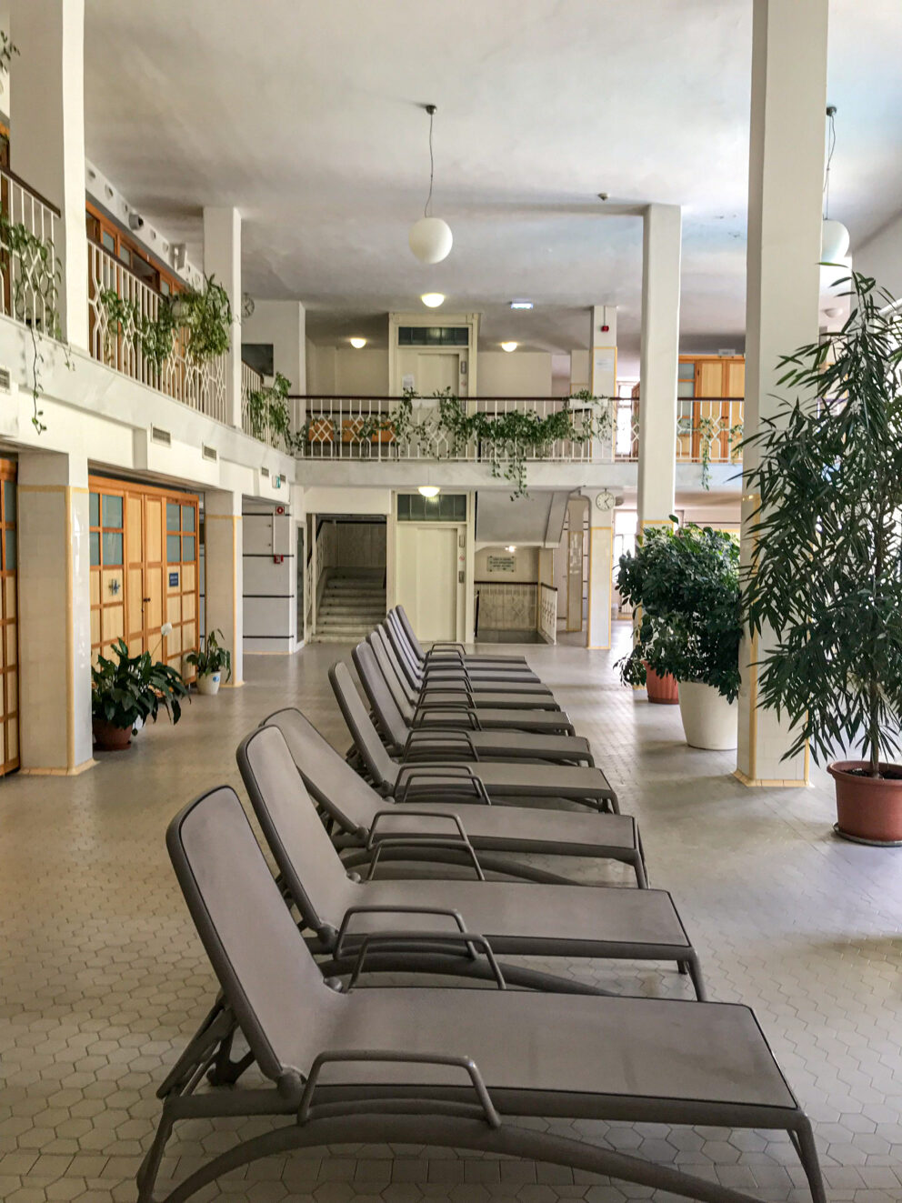 Comfortably placed clean relaxation loungers neatly organized inside the dedicated resting room