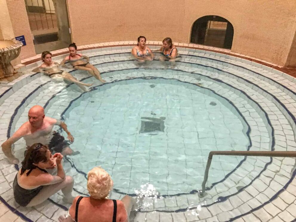 The historic indoor thermal pool area inside the Lukács Baths