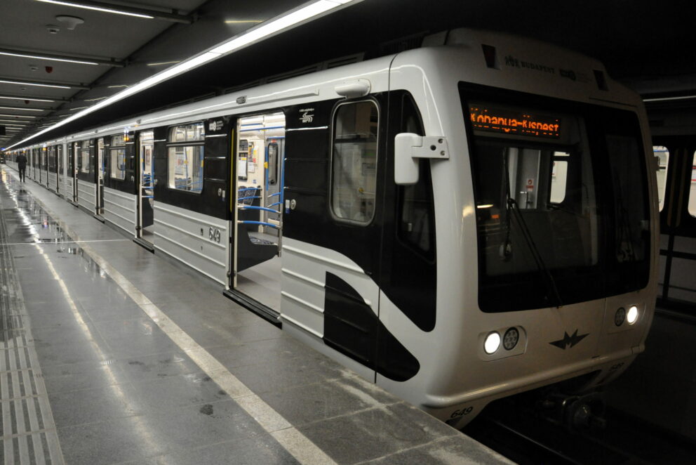 A renovated black and white train on Budapest's M3 blue metro line
