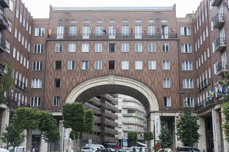 The massive red brick archway at Madach Imre Square