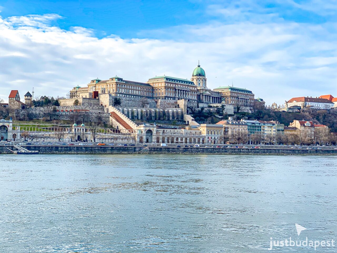 Several extremely clean modern Mahart passenger catamarans securely docked right at the downtown port