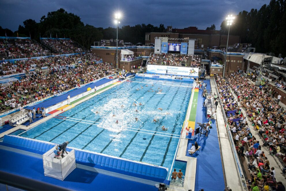 A night time water polo championship match on Margaret Island with a large crowd