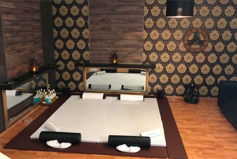 A bright and welcoming treatment room inside the local Massage House studio