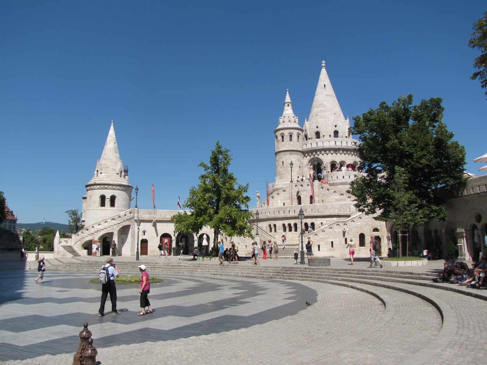 Matthias Church with its colorful tiled roof standing proudly next to the Fishermen's Bastion
