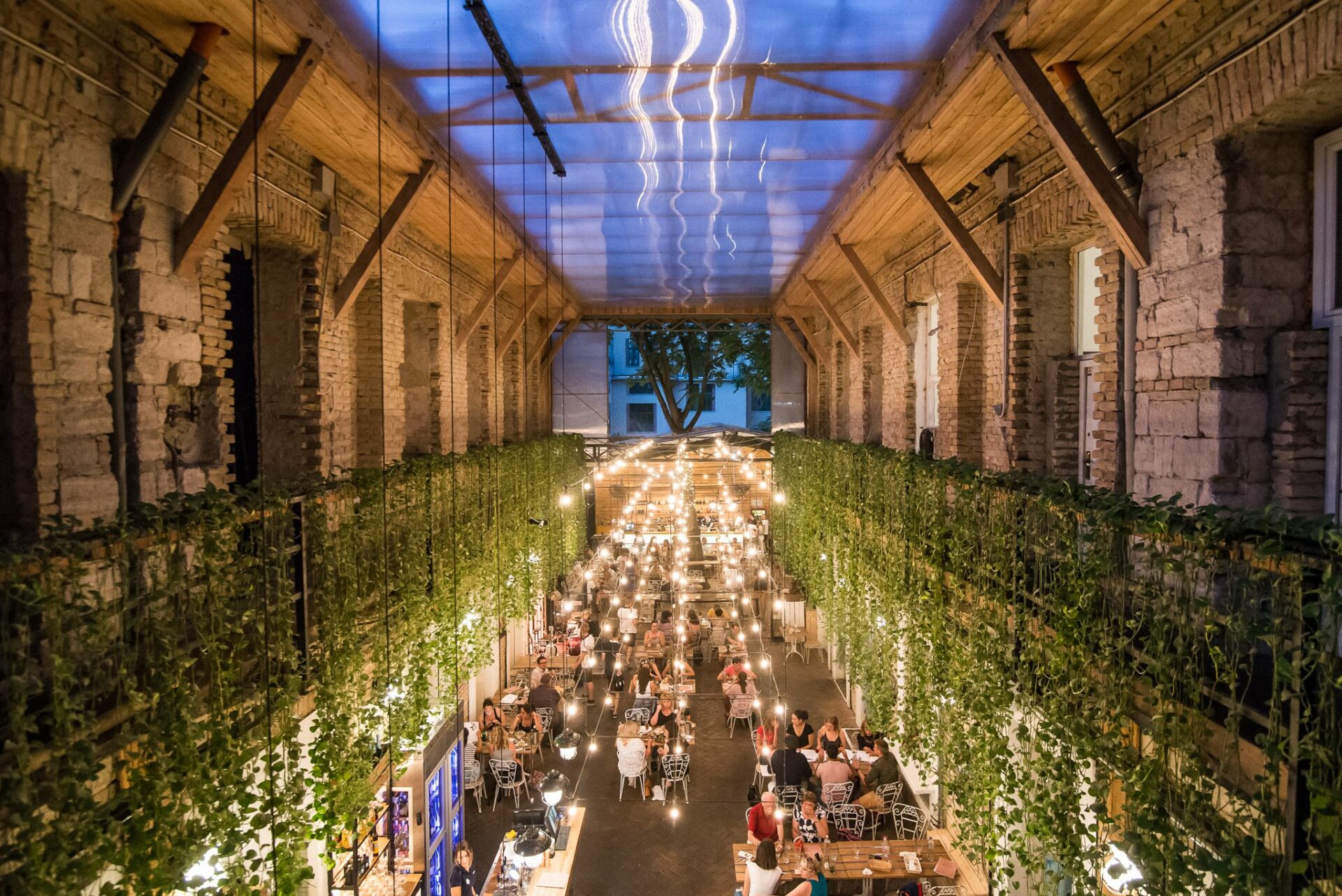 The stylishly decorated interior combining raw ruin pub aesthetics with elegant modern dining