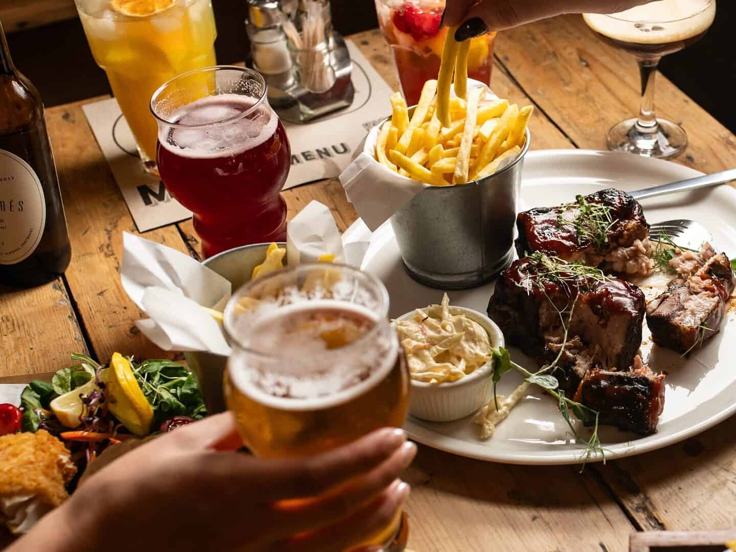 A festive and diverse spread of food and drinks at Most Bistro