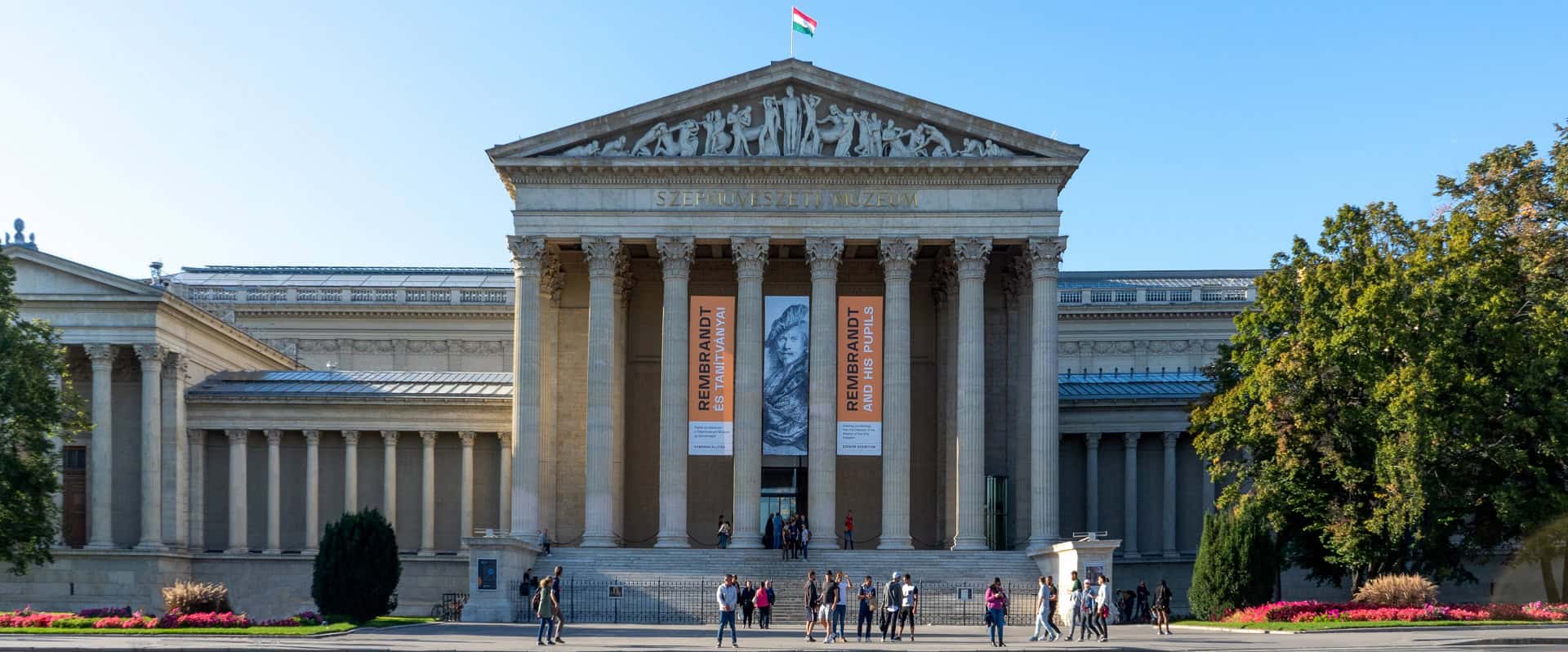 The magnificent classical facade of the Museum of Fine Arts featuring massive stone Corinthian columns located in Heroes' Square