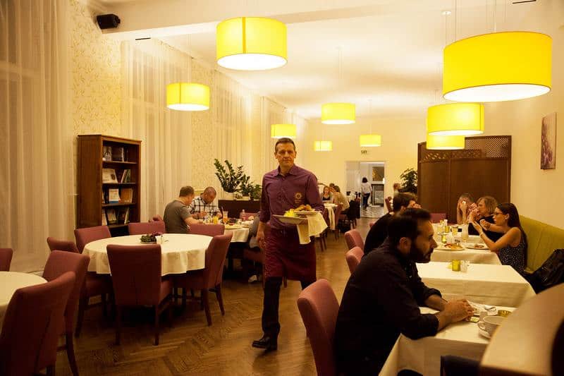 The comfortable retro interior of Napfényes vegan restaurant