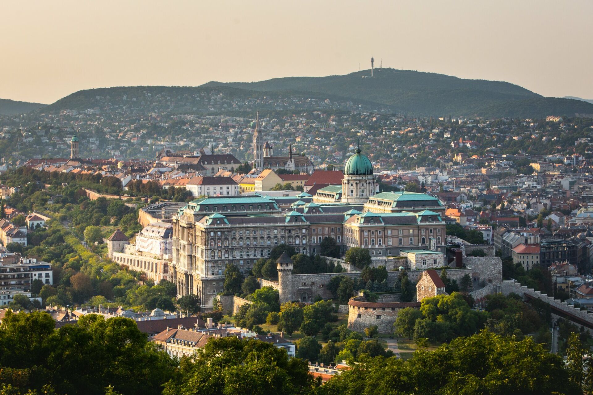 An ultra-wide panoramic view of the curving Danube from the top of Gellért Hill