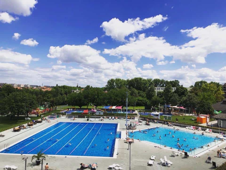The modern outdoor lap swimming pool at Paskal Baths on a sunny day