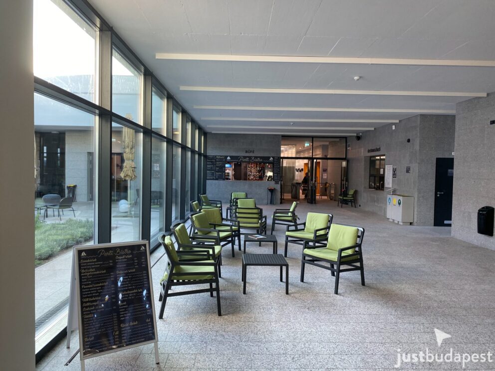 The spacious modern lobby and cafe lounge area with large windows