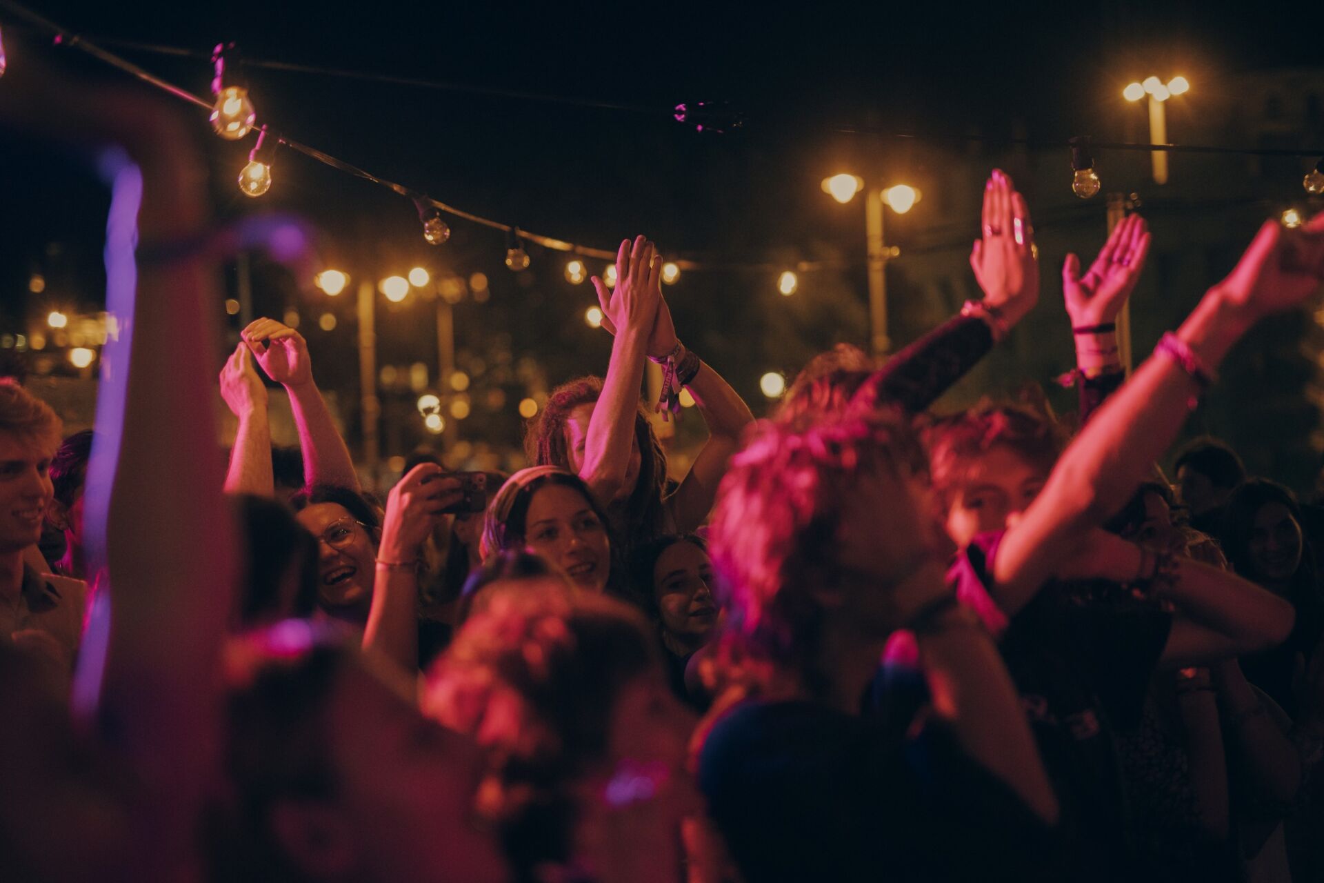 Crowds partying outdoors at the Pontoon club on the banks of the Danube