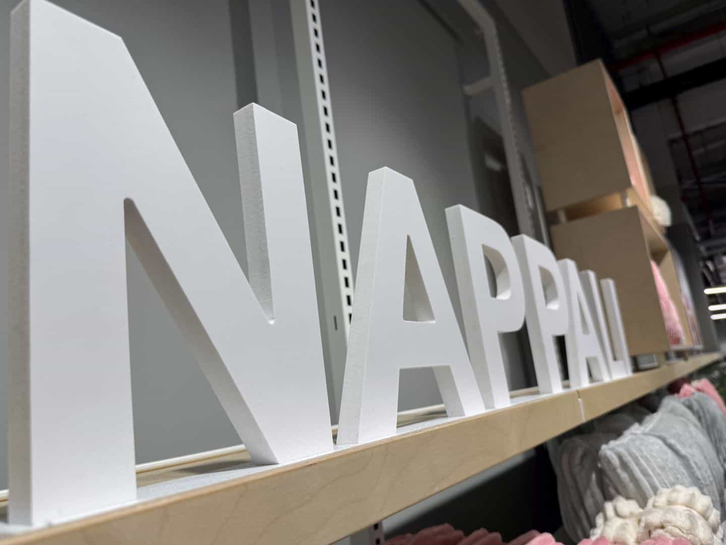 Large wooden letters spelling 'Nappali' in the stylish Primark home decor section