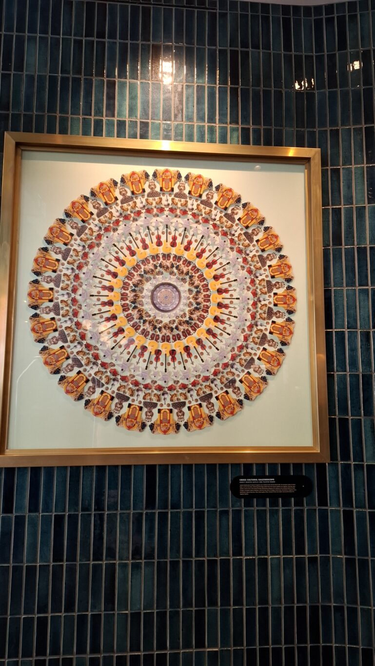Circular mandala wall art made of musical instruments at Pullman Budapest