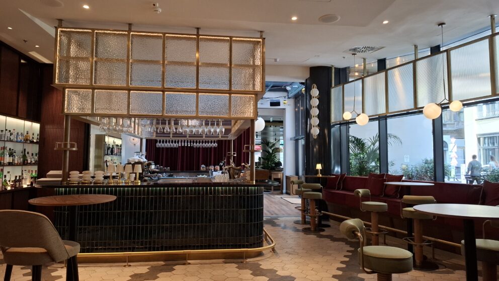 The elegant lobby bar inside the Pullman Budapest Hotel