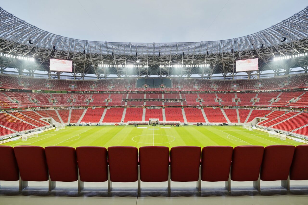 A wide view of the modern Puskas Arena stadium interior in Budapest
