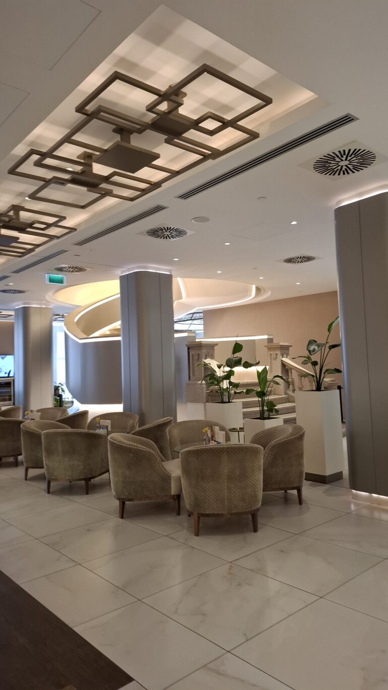 The sleek, newly remodeled modern lobby and lounge area of the hotel