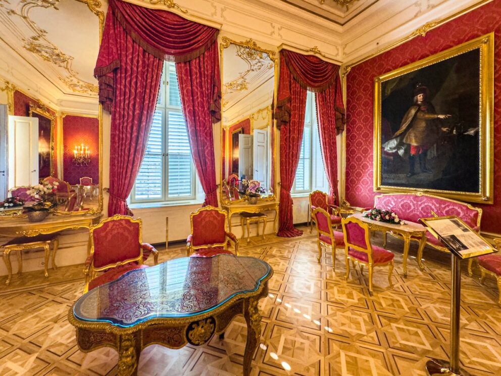 Antique clock and portrait in the corner of the Red Salon