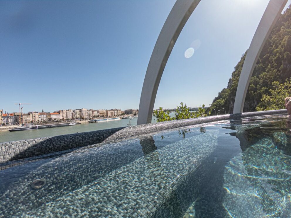 The rooftop panoramic hot tub at Rudas Bath overlooking the Danube