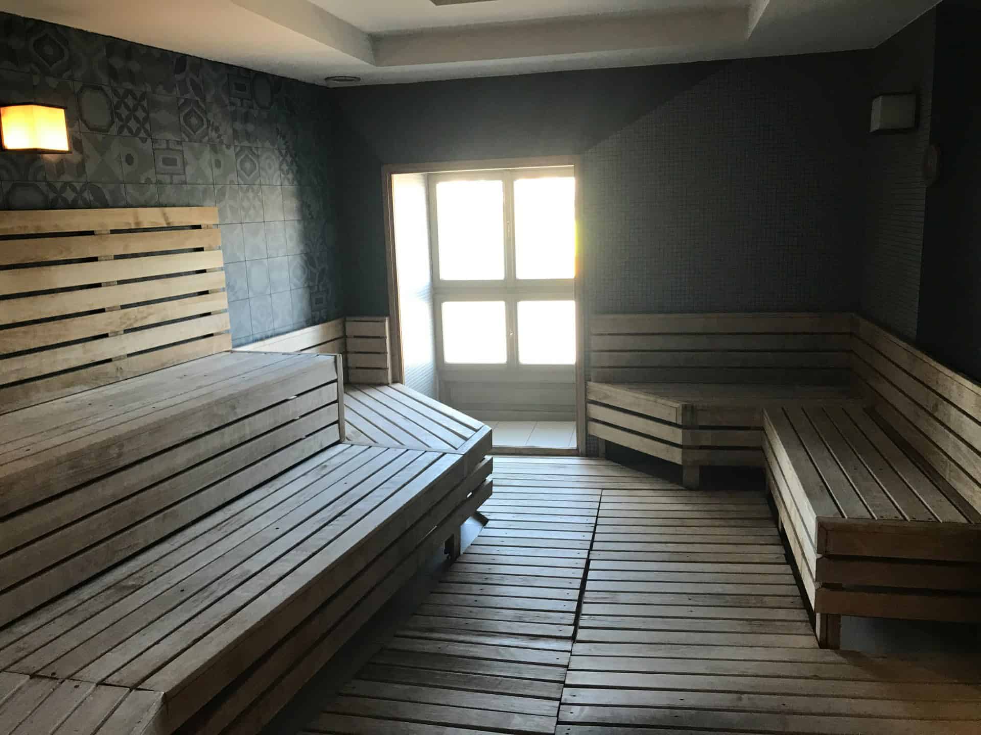 The interior of a traditional hot wooden sauna at Rudas Baths