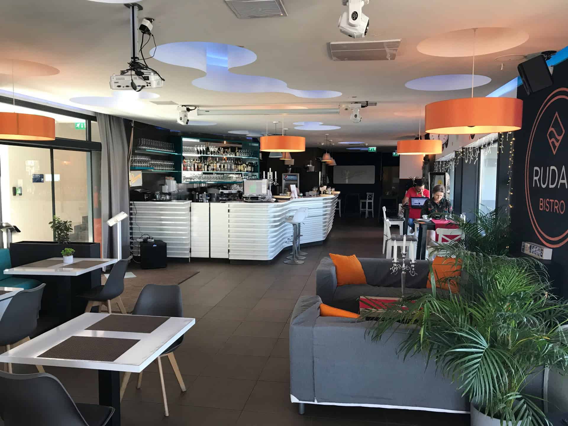 The modern Rudas Bistro restaurant area inside the bath complex