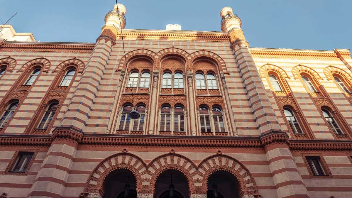 The striped Moorish Revival brick facade of the Rumbach Synagogue