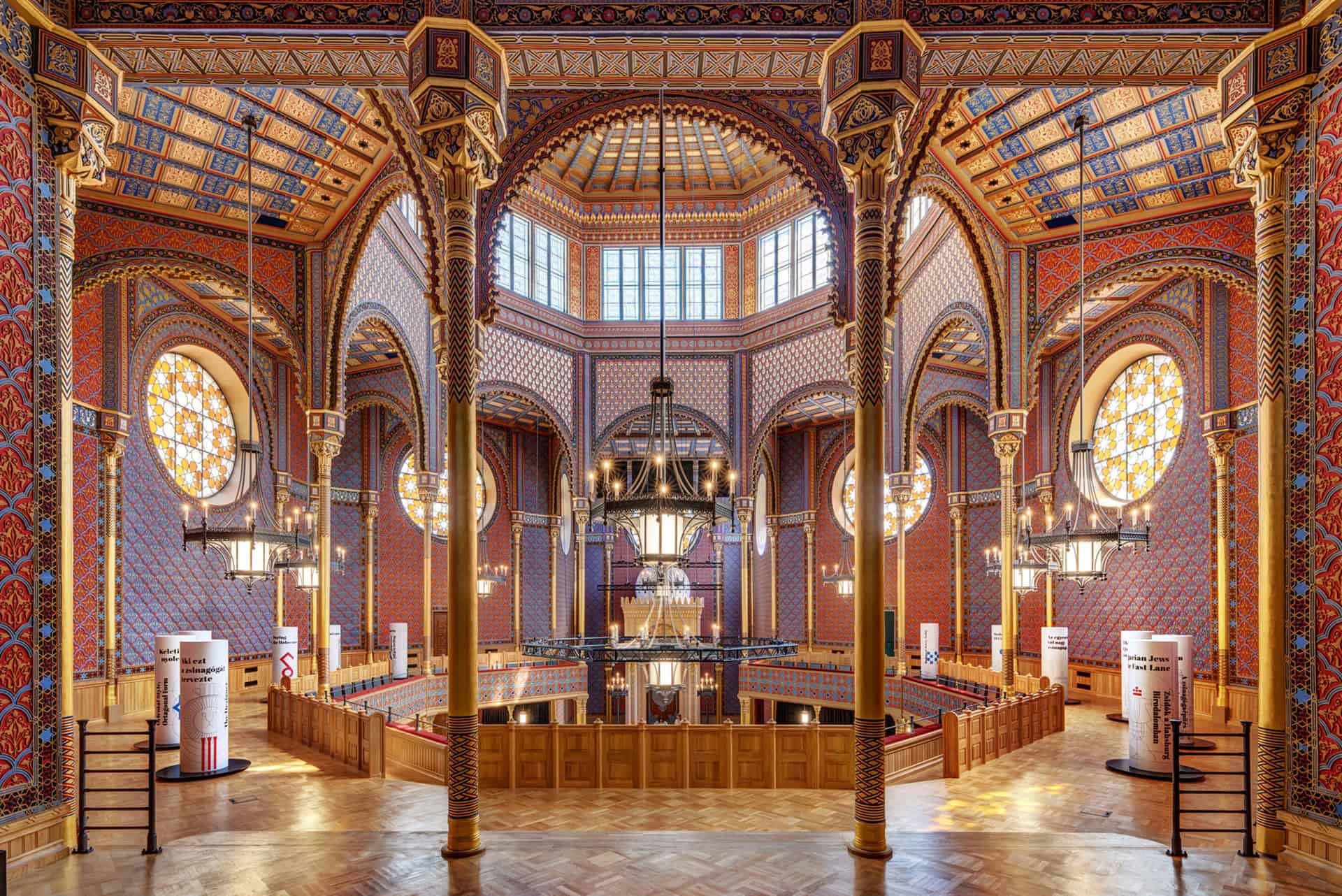 The colorful, restored octagonal interior of the Rumbach Street Synagogue