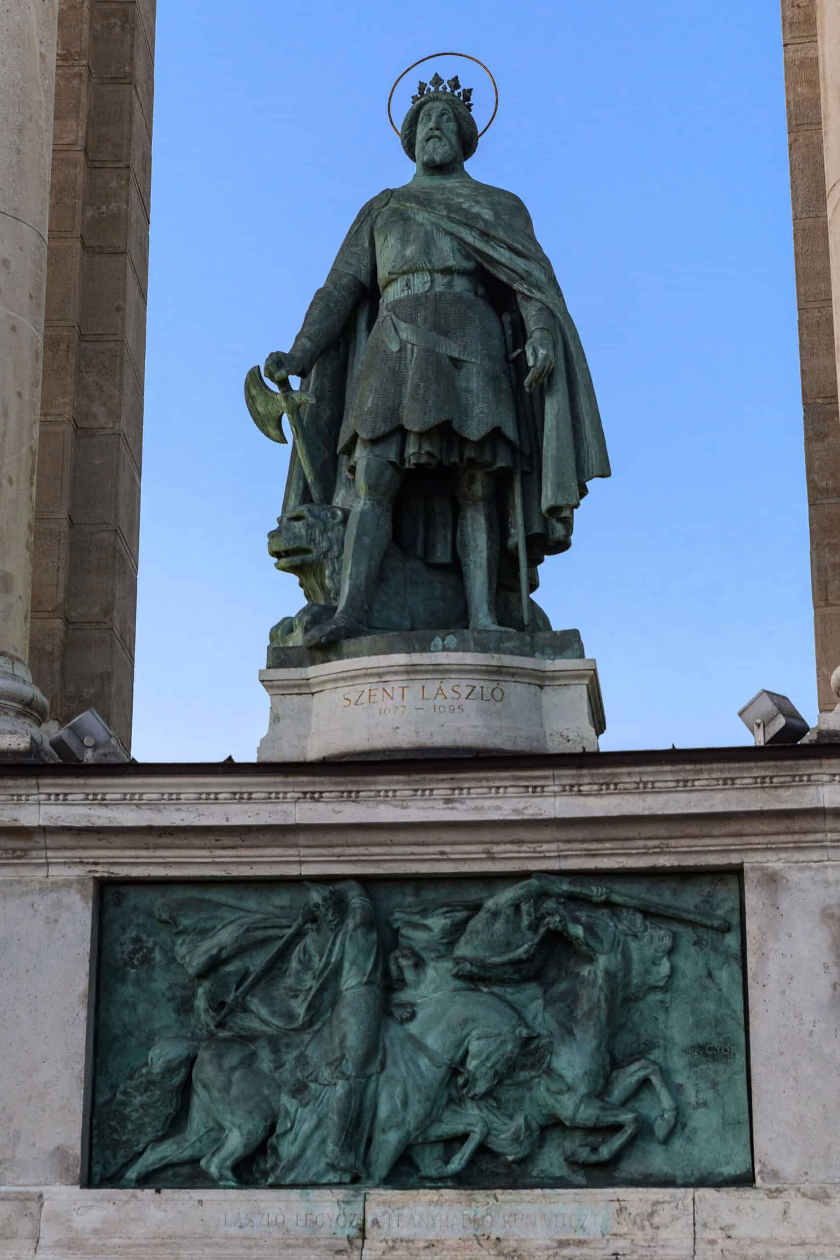 Close-up detail of the oxidized bronze armor on the St. Ladislaus statue