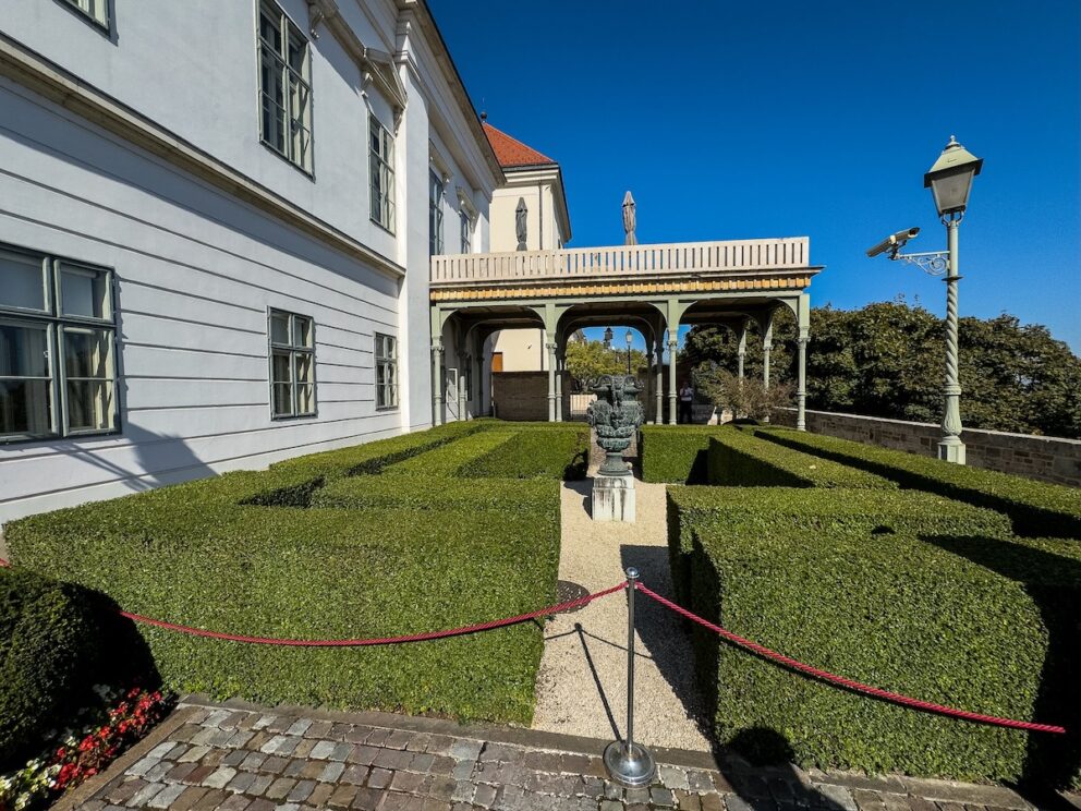 The eastern facade and long balcony of Sandor Palace