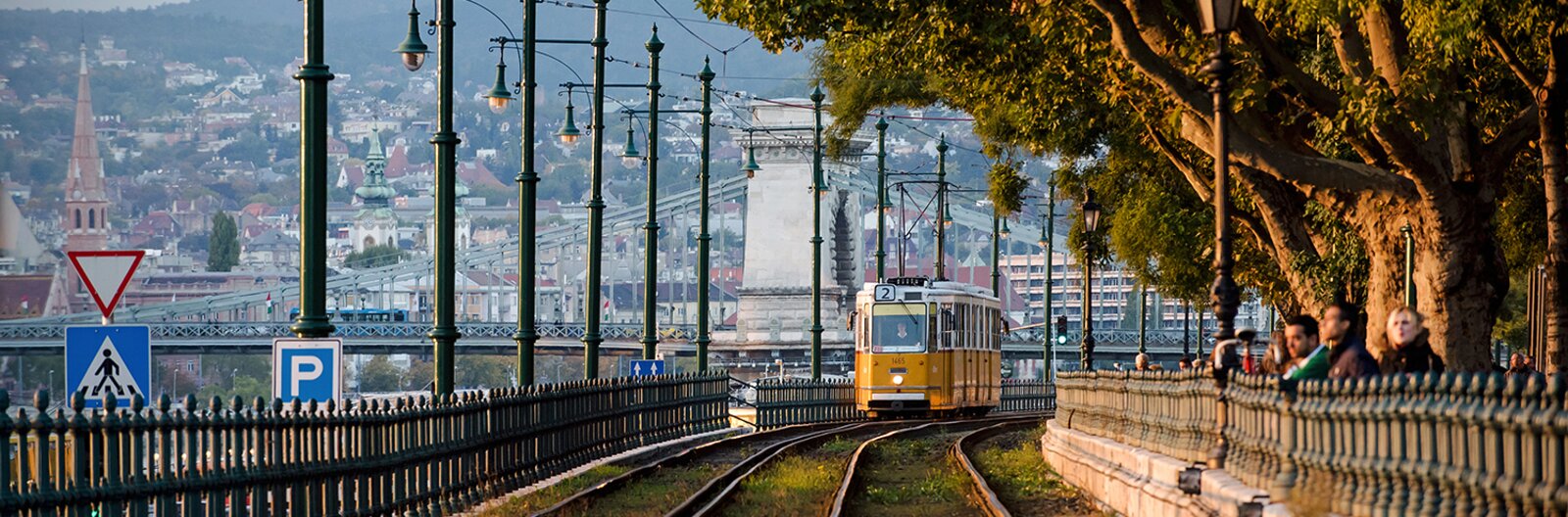 A wide view of Tram Line 2 passing in front of the Chain Bridge
