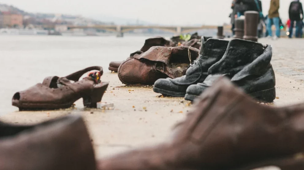 The poignant Shoes on the Danube Bank memorial located on the promenade