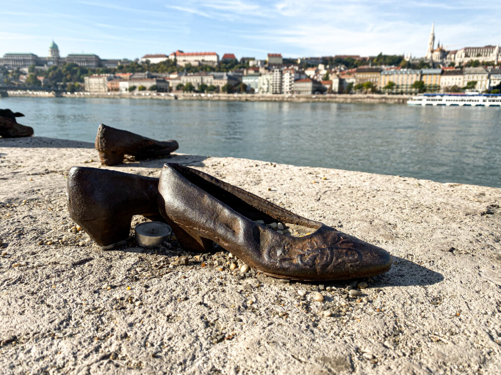 The rusted iron shoes of the Holocaust memorial cemented into the riverbank