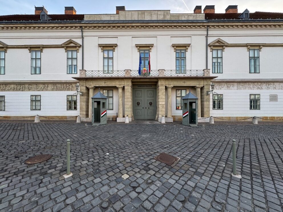 Traditional grey cobblestones paving the square in front of the palace