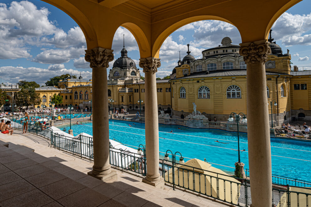 Aerial view of hundreds of people relaxing in the giant outdoor thermal pool at Széchenyi Baths