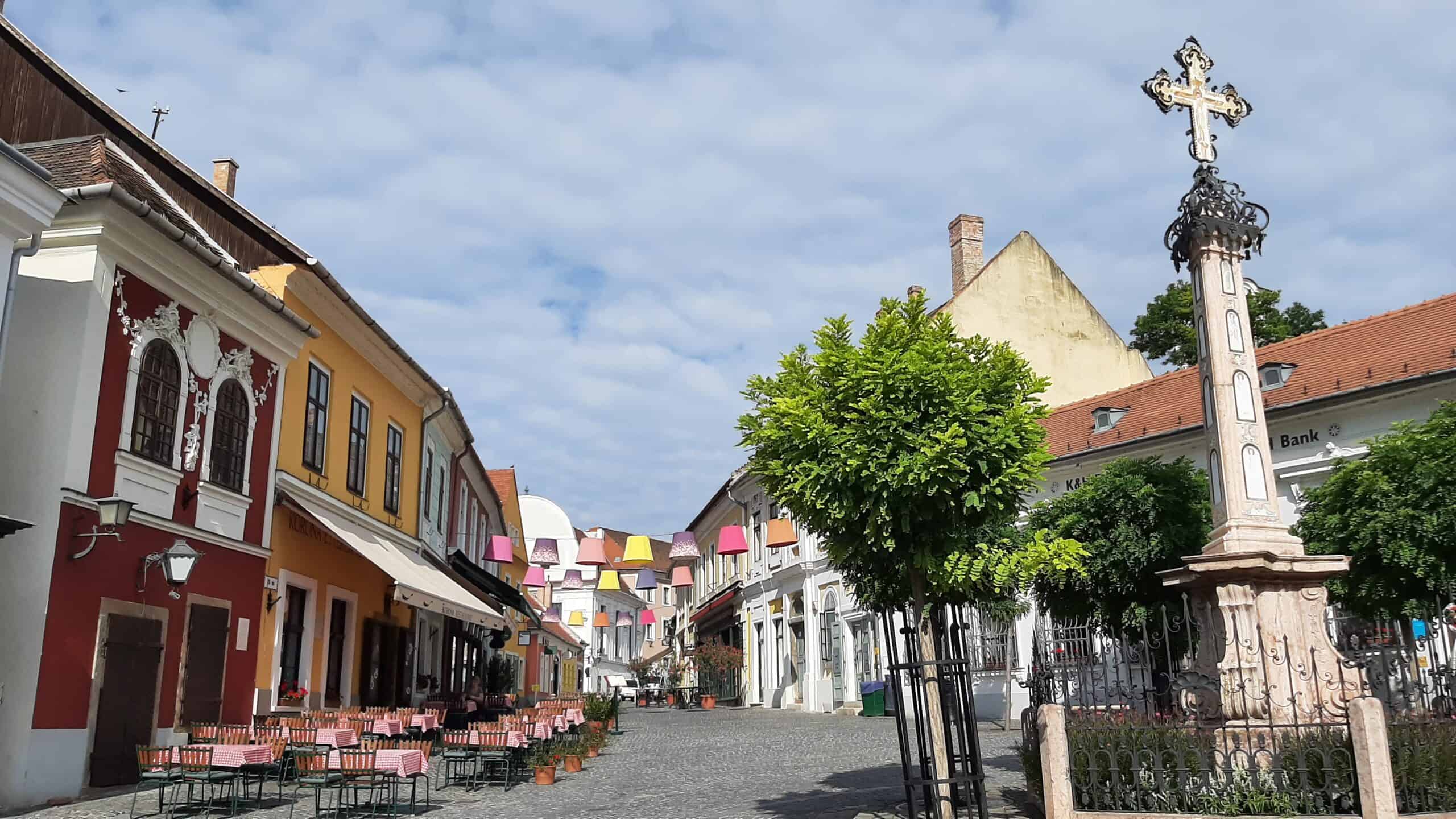 A colorful and picturesque cobblestone street in the historic town of Szentendre near Budapest.