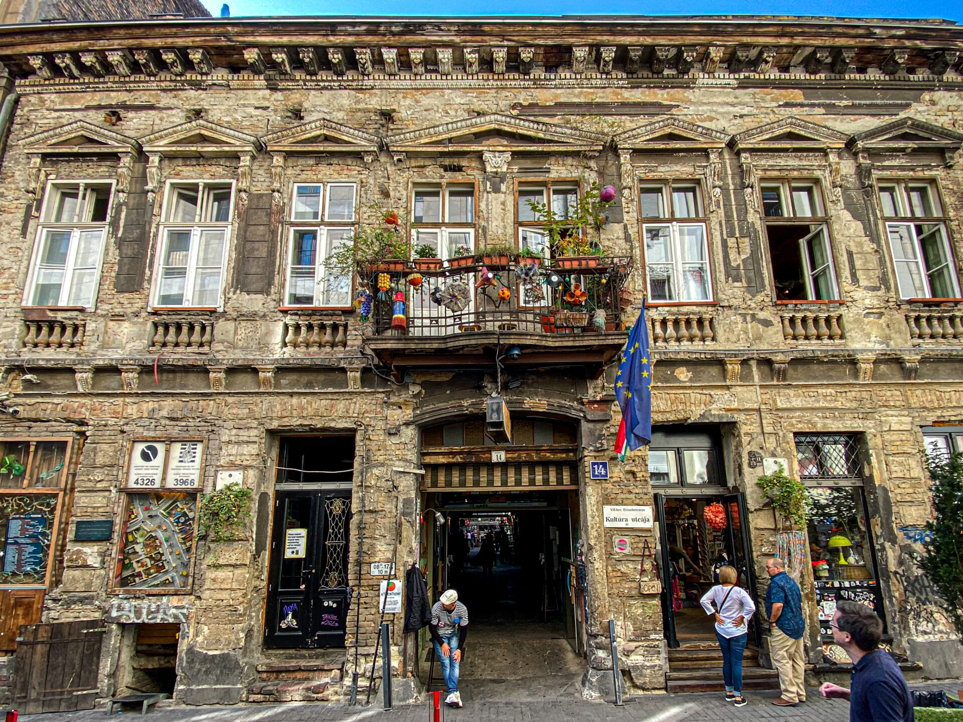 The dilapidated but charming exterior facade of the Szimpla Kert building